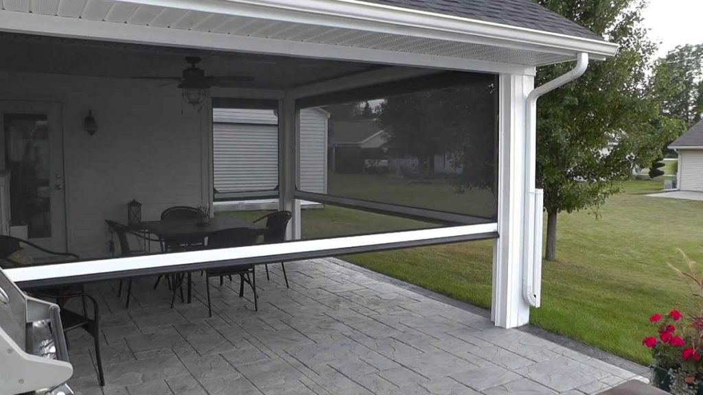 Motorized screens installed on a lanai or patio, providing customizable protection from insects and elements with seamless integration and easy controls.