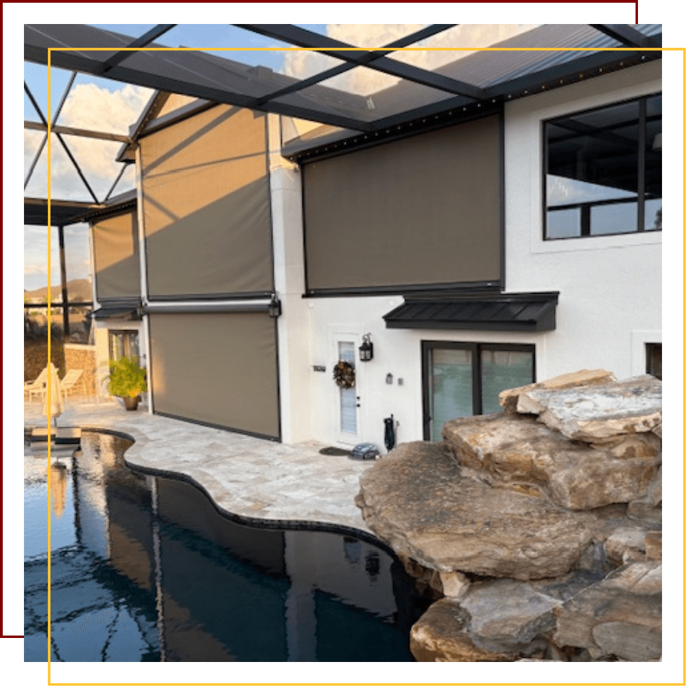 House on the water with hurricane shutters